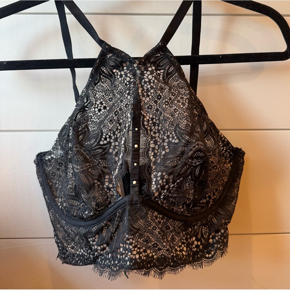Victoria’s Secret black lace bra, size 36C, labeled “very sexy”